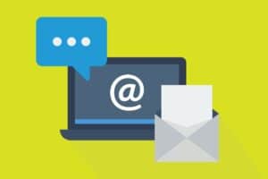 laptop, envelop and message icons representing email marketing message development