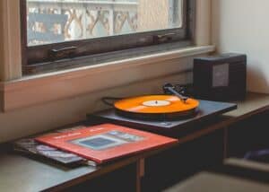 image of vintage vynil on a table near a window for the article how old and effective your crm data is?